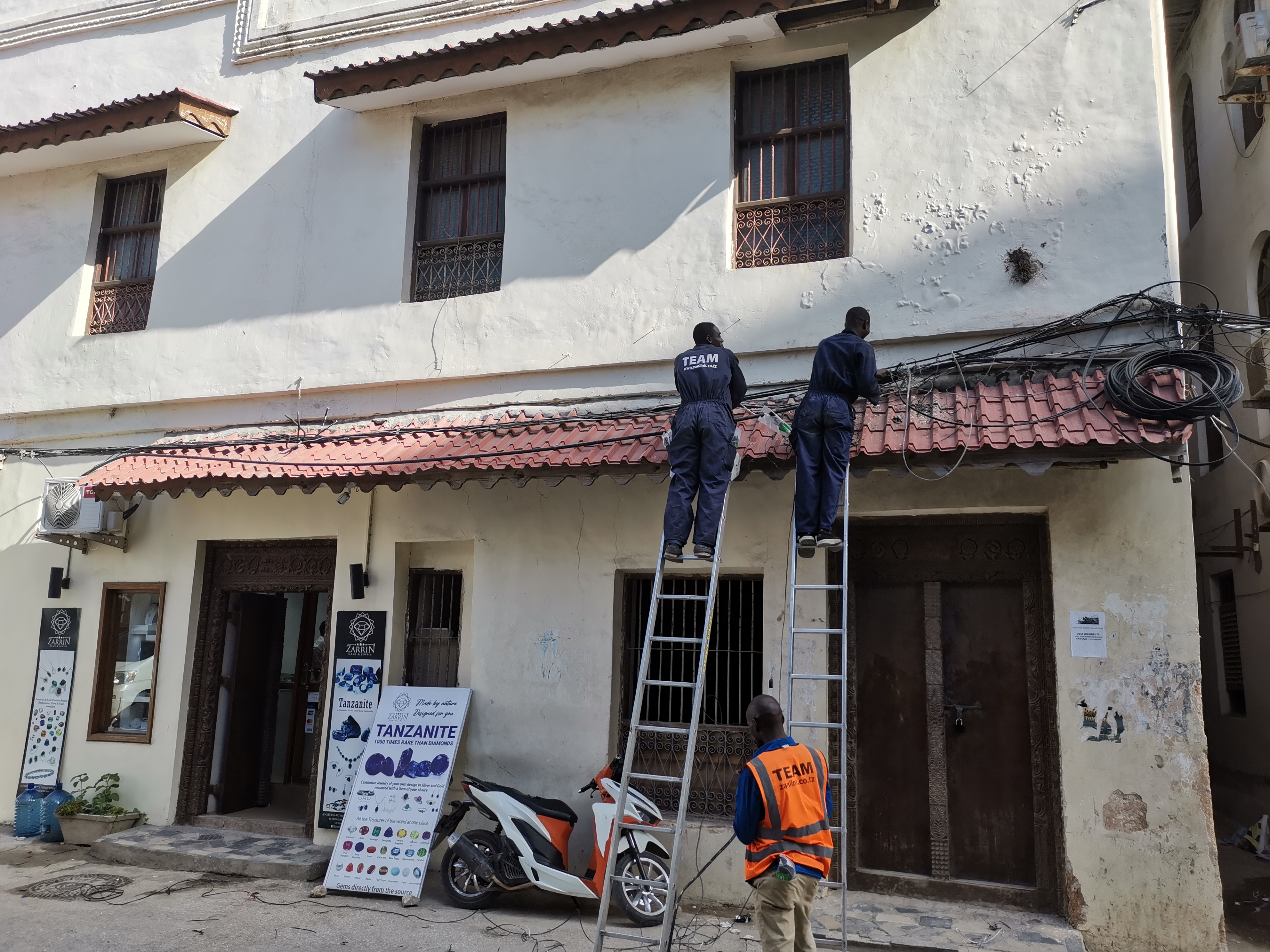 Historic building in Stone Town undergoing preservation and restoration work